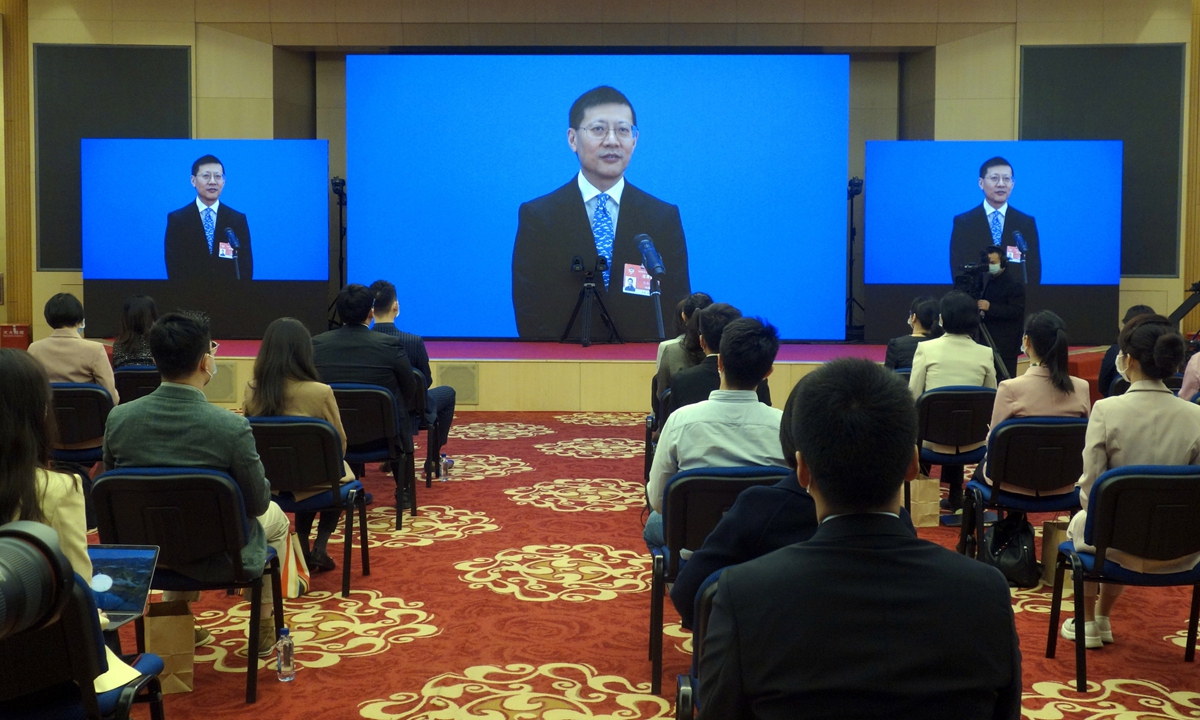 Shen Nanpeng, a member of the 13th National Committee of the Chinese People's Political Consultative Conference (CPPCC), gives an interview via video link ahead of the second plenary meeting of the fourth session of the 13th CPPCC National Committee at the Great Hall of the People in Beijing on Sunday. Photo: cnsphoto
