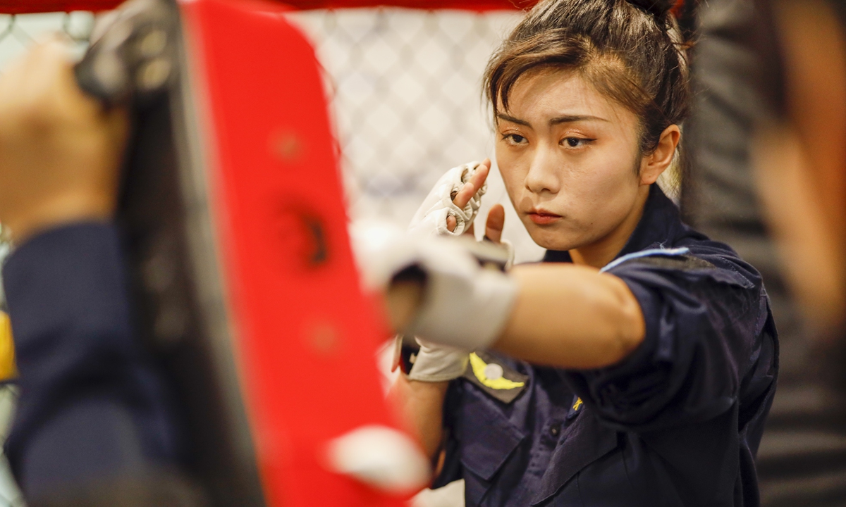 Li Sijia, an in-flight security officer, takes her daily combat training.