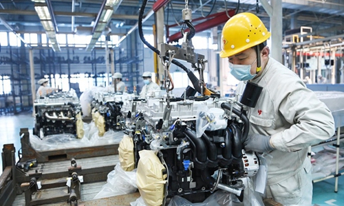 A man works at a workshop of Harbin Dongan Automotive Engine Manufacturing Co., Ltd. in northeast China's Heilongjiang Province, Feb. 25, 2021.(Photo: Xinhua)