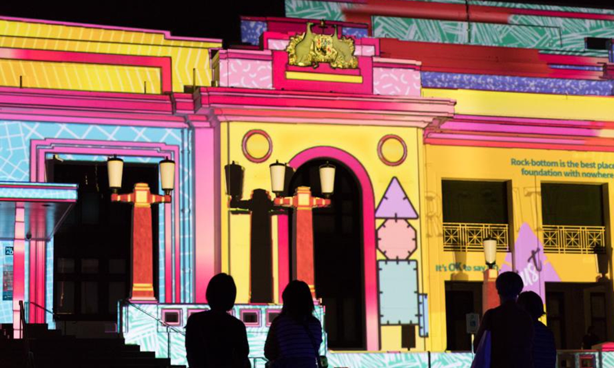 Photo taken on March 8, 2021 shows the lights projected on the Old Parliament House during the Enlighten Festival in Canberra, Australia. The annual Enlighten Festival runs from Feb. 26 to March 8 in Canberra with landmark buildings illuminated with colorful lights. (Photo by Liu Changchang/Xinhua)