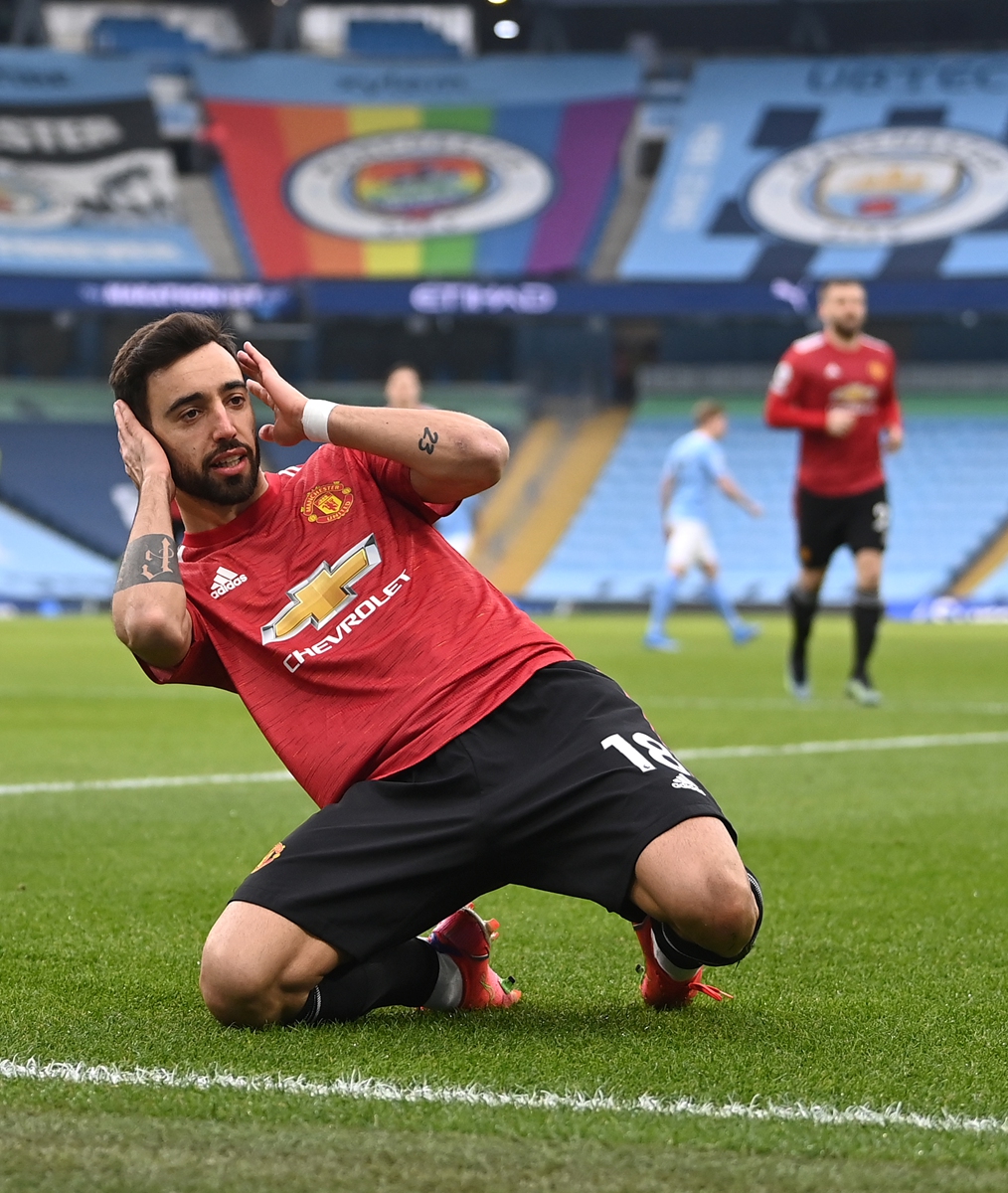 Manchester United's Bruno Fernandes celebrates scoring against Manchester City on Sunday in Manchester, England. Photo: VCG
