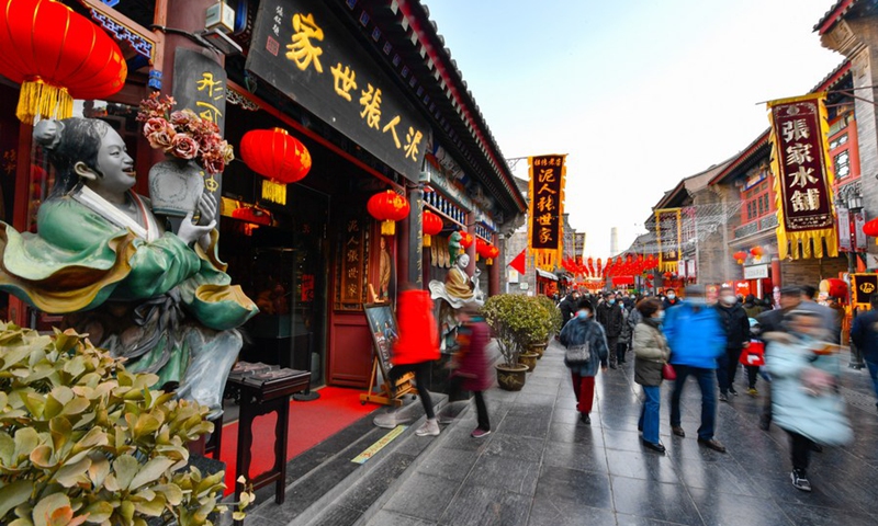 People visit an ancient cultural street in Tianjin, north China, Feb. 17, 2021, the last day of this year's Spring Festival holiday. (Photo: Xinhua)