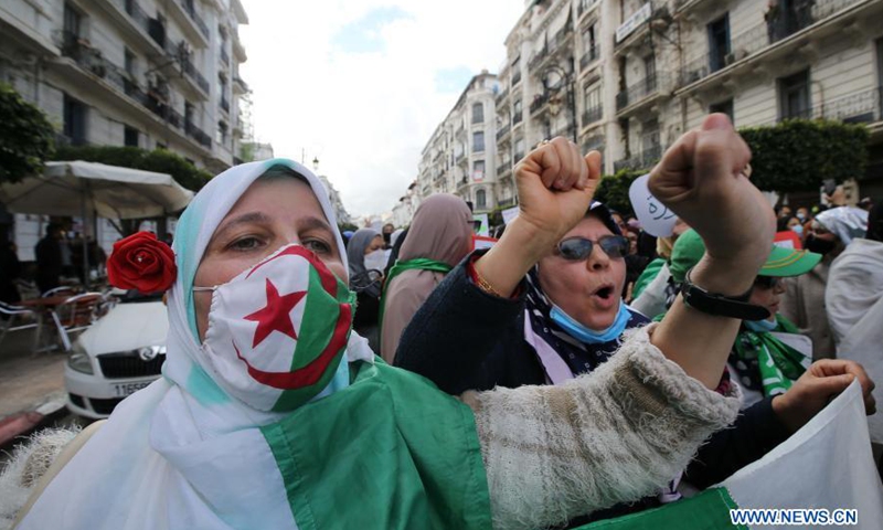 Algerian women call for protecting women rights on the occasion of the International Women's Day in Algiers, Algeria, on March 8, 2021.Photo:Xinhua