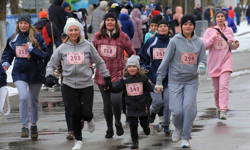 Contestants attend a race to mark the International Women's Day held in Zhodzina, Belarus, March 8, 2021. (Photo: Xinhua)