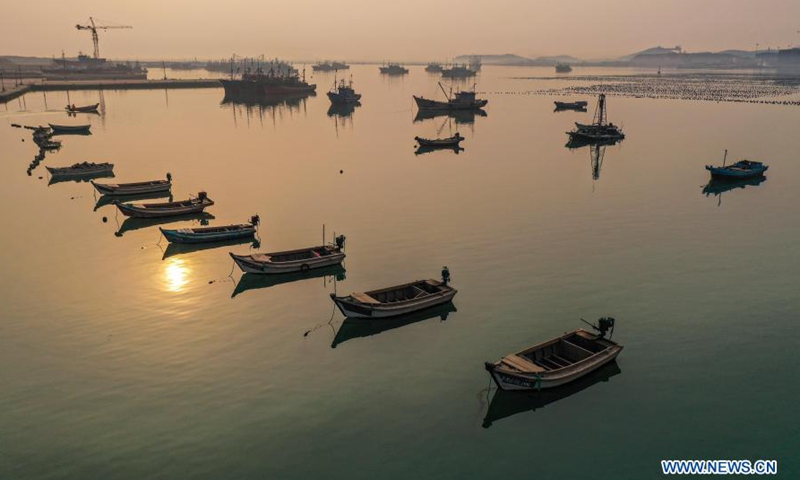 Aerial photo taken on March 9, 2021 shows boats docking at the port in Lidao Township, Rongcheng City, east China's Shandong Province.Photo:Xinhua