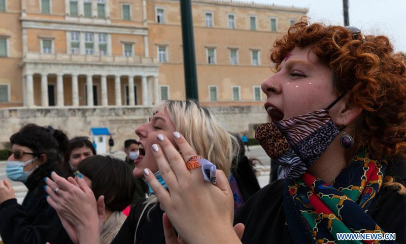 Women demonstrate at Syntagma square, in front of the Greek Parliament, in Athens, Greece, on March 8, 2021. on the occasion of International Women's Day.Photo:Xinhua
