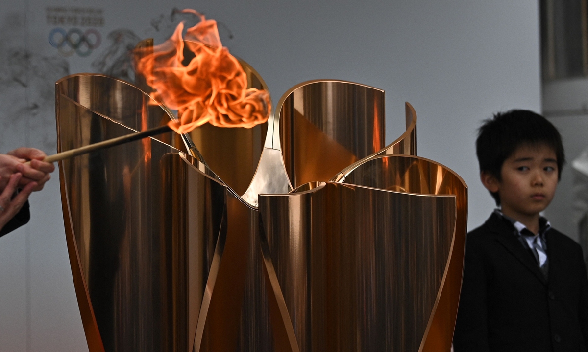 The Tokyo 2020 Olympic flame being displayed outside Fukushima railway station in Fukushima Prefecture. The starting ceremony for the Olympic torch relay, which will begin on March 25, 2021, will likely be held without spectators, a Japanese newspaper reported on March 9, 2021, but fans will still be able to line the route. Photo: VCG