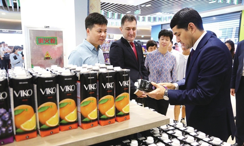 Merchants promote goods to visitors at the cross-border e-commerce experience center of Lianyungang Free Trade Zone in Lianyungang, East China's Jiangsu Province, in August 2020. Photo: IC