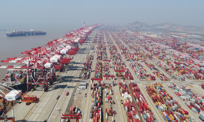 Aerial photo taken on March 18, 2020 shows the container dock of Shanghai's Yangshan Port, east China.(Photo: Xinhua)