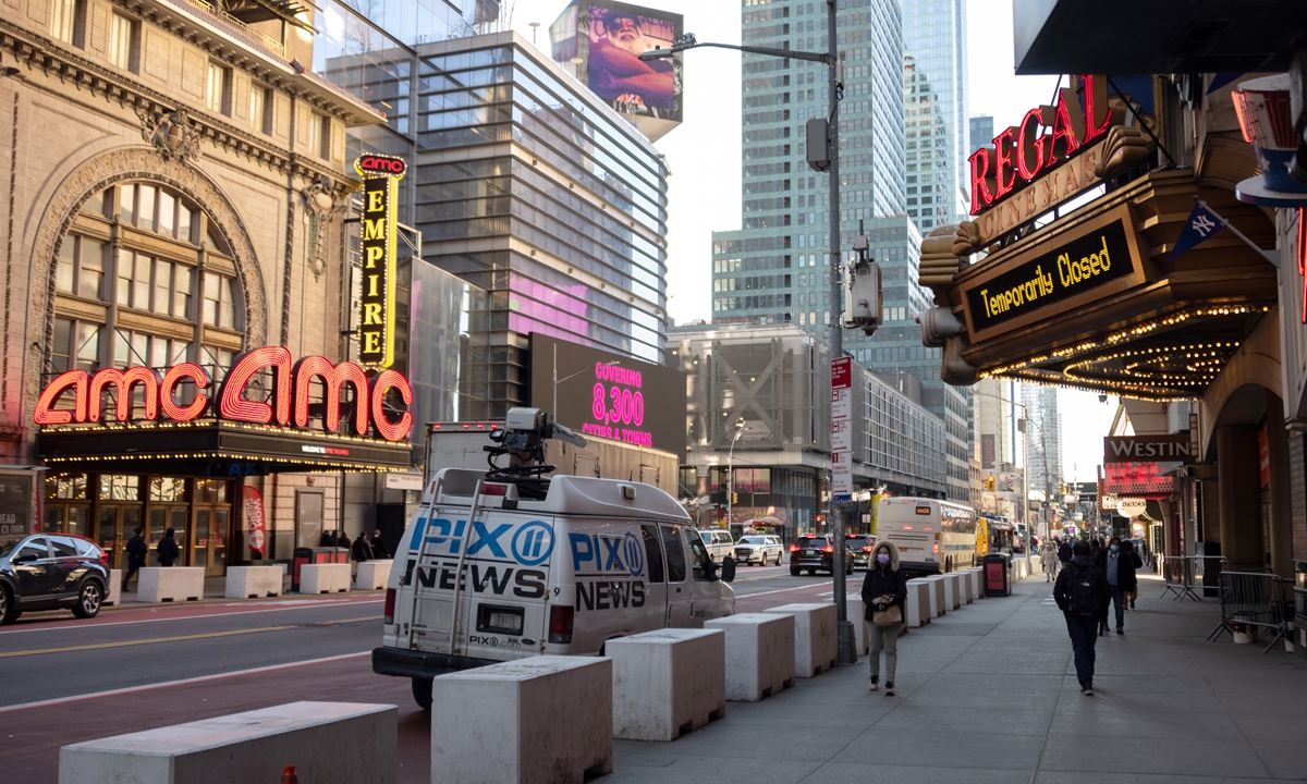 A view of the newly reopened AMC Empire 25 opposite a Regal cinema which remains closed in Times Square on March 05, 2021 in New York City. Photo: VCG