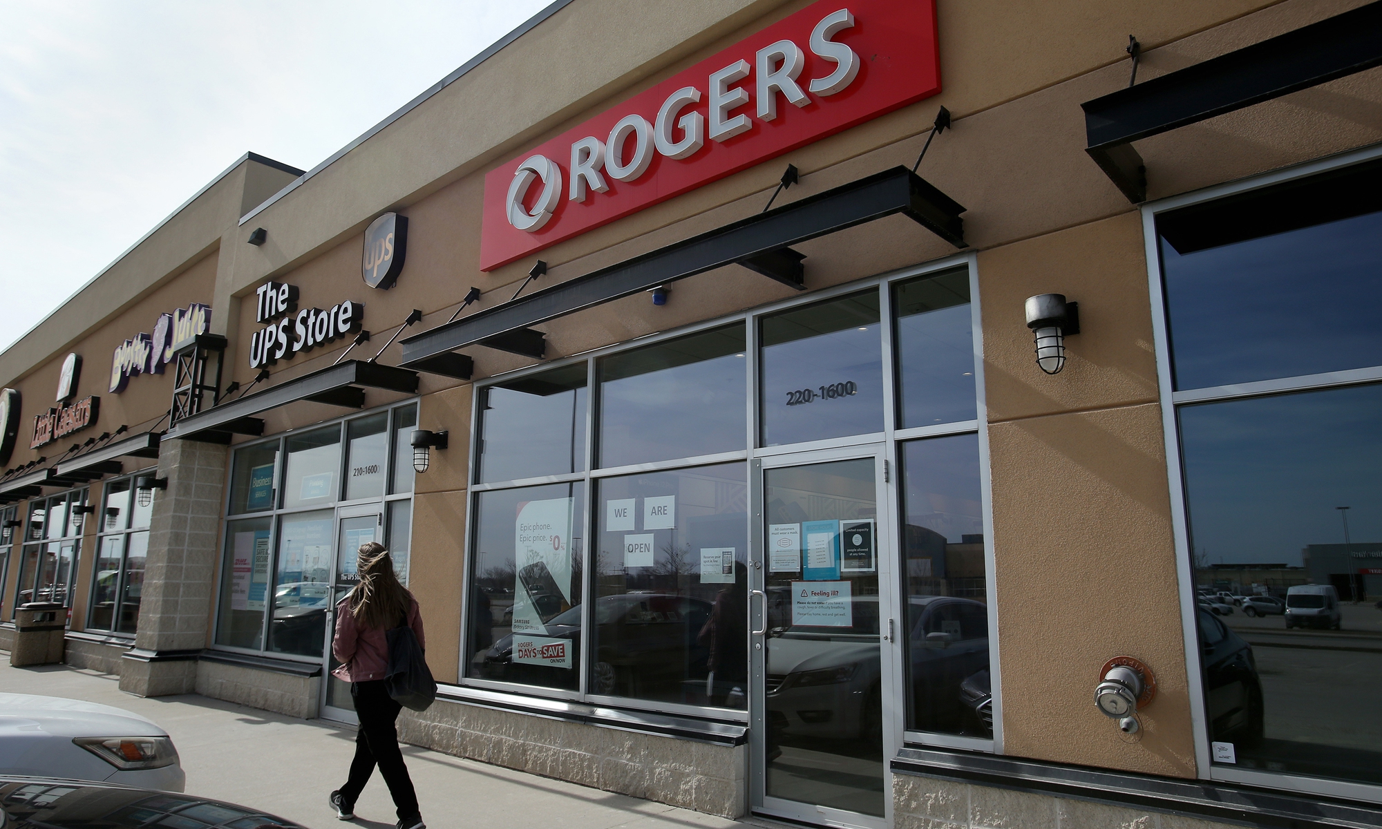 A pedestrian walks past a Rogers store in Winnipeg, Manitoba, Canada, on Monday. Photo: VCG
