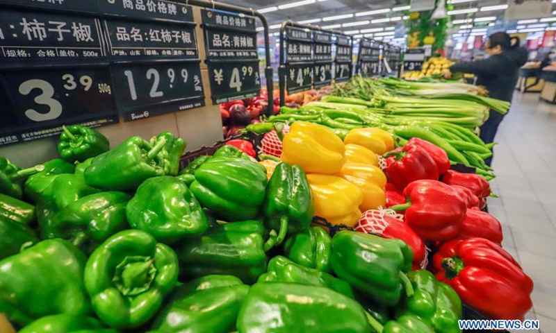 People select food at a supermarket in Zunhua City of Tangshan, north China's Hebei Province, March 10, 2021.Photo:Xinhua