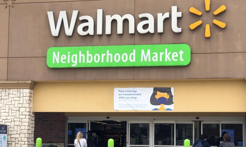 Customers walk into a Walmart store in Plano, a northern suburban city of Dallas, Texas, the United States, on March 10, 2021. As statewide mask mandate ended on Wednesday, some businesses and public places in the U.S. state of Texas still require face coverings and other safety practices to contain the spread of the coronavirus.Photo:Xinhua