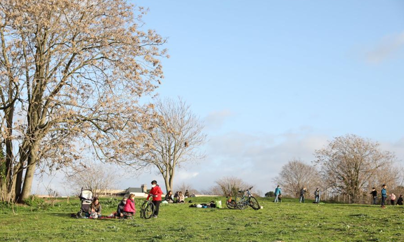 People enjoy their weekend in Parco della Caffarella in Rome, Italy, on March 13, 2021. Italy approved a fresh round of tight anti-COVID-19 restrictions nationwide on Friday, as the virus variants circulating in the country were boosting infections.Photo:Xinhua