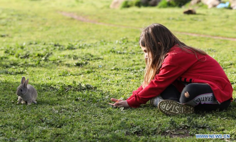People enjoy their weekend in Parco della Caffarella in Rome, Italy, on March 13, 2021. Italy approved a fresh round of tight anti-COVID-19 restrictions nationwide on Friday, as the virus variants circulating in the country were boosting infections.Photo:Xinhua