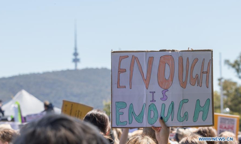 Photo taken on March 15, 2021 shows marches and protests in front of the Parliament House in Canberra, Australia. Photo:Xinhua