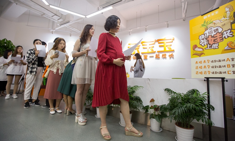 A company in Hangzhou, East China's Zhejiang Province held a job fair for women on August 21, 2018, welcoming child-bearing women. Photo: VCG

