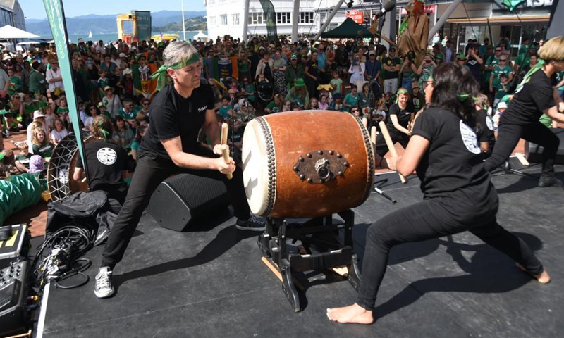 People perform during an activity to celebrate St. Patrick's Day in Wellington, New Zealand, March 14, 2021.Photo:Xinhua