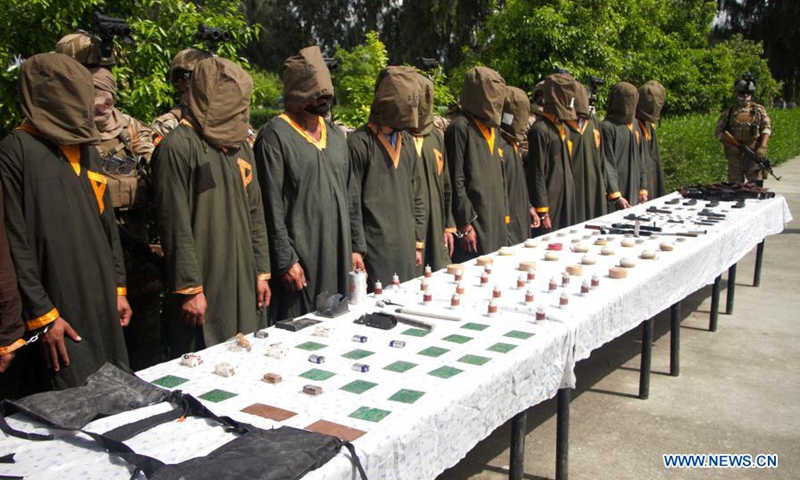 Suspected militants arrested by Afghan security force members are seen in Jalalabad city, capital of Nangarhar province, Afghanistan, March 14, 2021. The personnel of Afghanistan's national intelligence agency have recently captured 19 militants in the country's eastern Nangarhar province, the province's governor said Sunday.(Photo: Xinhua)