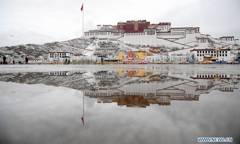 Photo taken on March 14, 2021 shows the snow scenery of Potala Palace in Lhasa, capital of southwest China's Tibet Autonomous Region.(Photo: Xinhua)