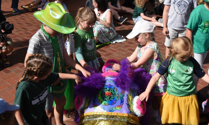 People participate in an activity to celebrate St. Patrick's Day in Wellington, New Zealand, March 14, 2021.Photo:Xinhua