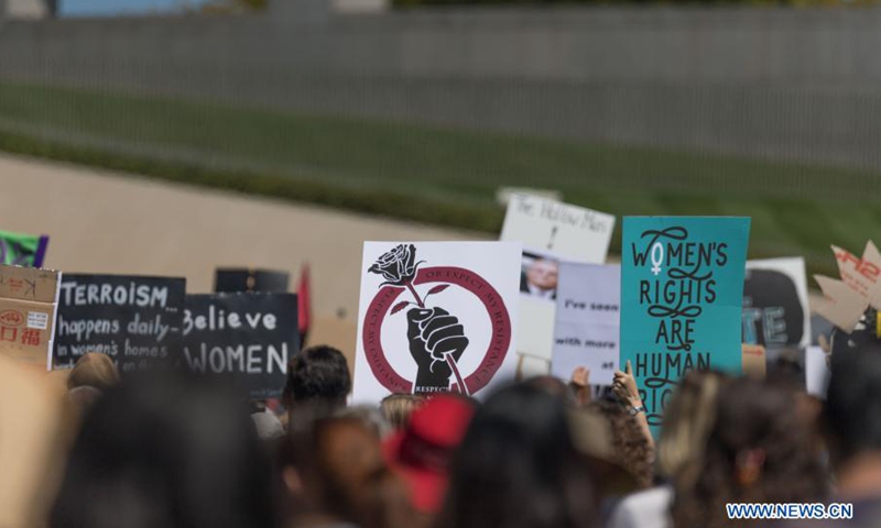 Photo taken on March 15, 2021 shows marches and protests in front of the Parliament House in Canberra, Australia.Photo:Xinhua