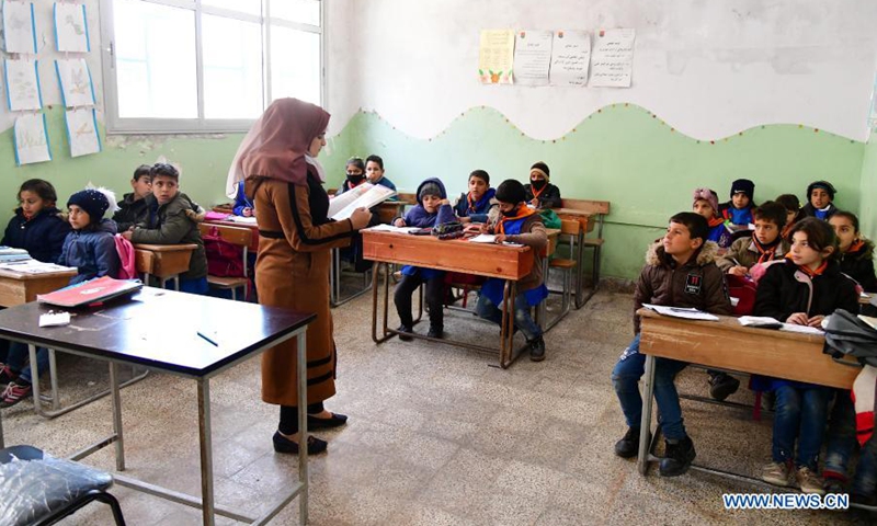 Syrian students attend a class at a school in Quneitra, southern Syria, on March 16, 2021.(Photo: Xinhua)