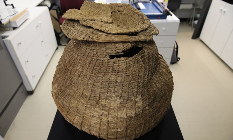 A well-preserved basket dates to the Pre-Pottery Neolithic period, approximately 10,500 years ago, is seen in the Israel Museum in Jerusalem on March 16, 2021.(Photo: Xinhua)
