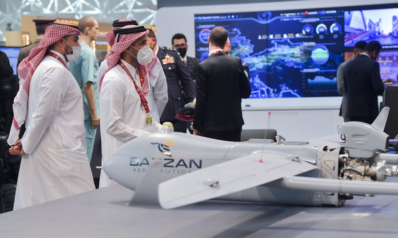 Visitors look at the exhibits at Milipol Qatar 2021, an international event for homeland security and civil defense, in Doha, Qatar, on March 15, 2021.(Photo: Xinhua)