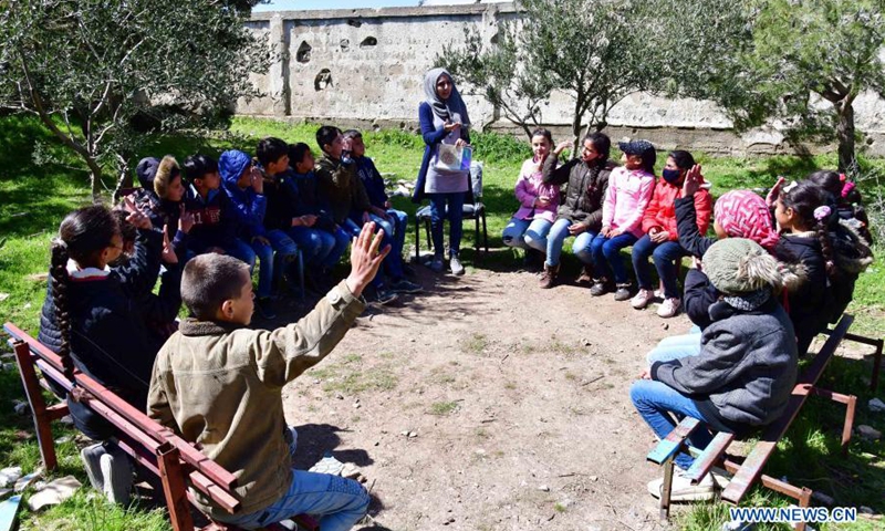 Syrian students attend an outdoor class in Quneitra, southern Syria, on March 16, 2021.(Photo: Xinhua)
