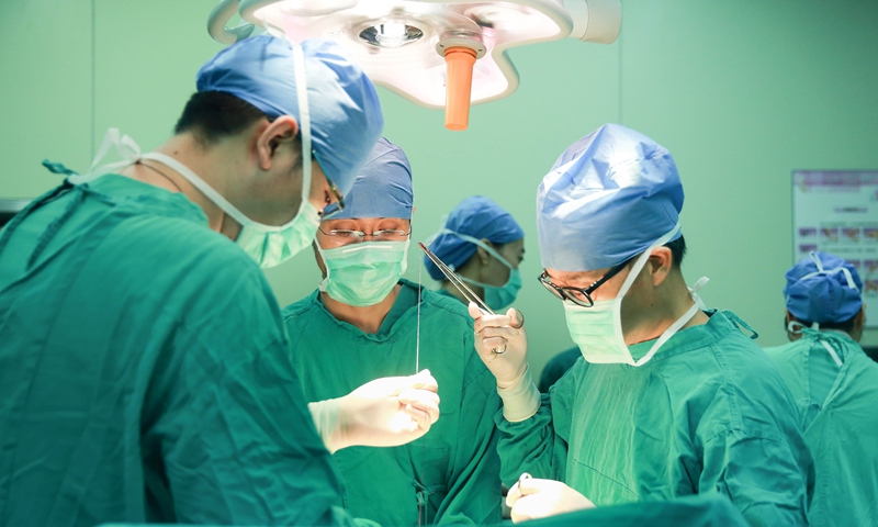 Doctors busy operating on a patient at Wuxi No.2 People's Hospital in Wuxi, East China's Jiangsu Province on August 9, 2018 Photo: VCG

