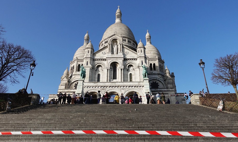 The area in front of the Sacre Coeur Basilica is blocked by the police atop the Montmartre in Paris, France, Feb. 24, 2021. (Photo: Xinhua)