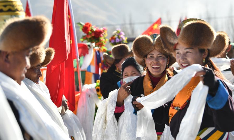 People take part in a ceremony marking the start of spring ploughing in Shannan, southwest China's Tibet Autonomous Region, March 16, 2021.(Photo: Xinhua)