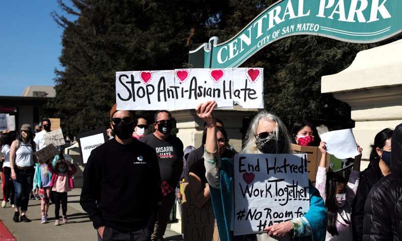 People take part in a rally against anti-Asian hate crimes in San Mateo, California, the United States, on Feb. 27, 2021. (Photo: Xinhua)
