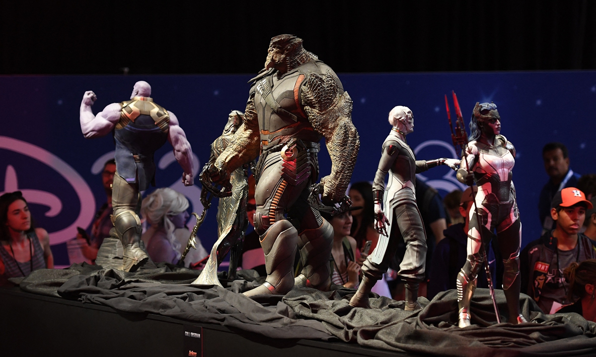 People look at a display of Avengers villains at the Marvel Studios exhibit during the D23 expo fan convention at the Convention Center in Anaheim, California, on July 16, 2017. Photo: AFP