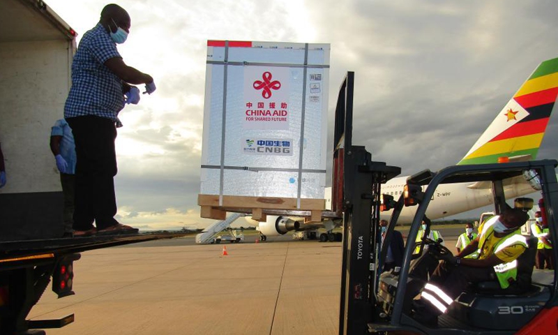 A box containing China-donated vaccines is loaded onto a truck at the Hosea Kutako International Airport in Namibia's capital Windhoek on March 16, 2021.Photo:Xinhua