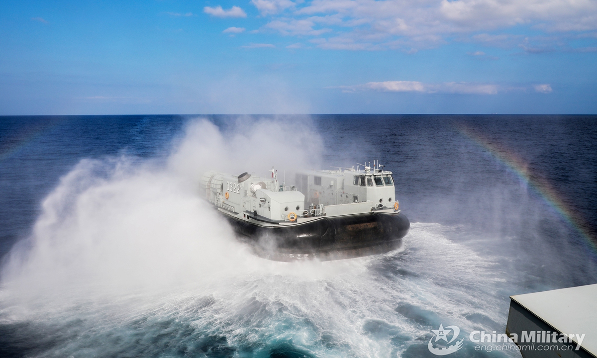 Air-cushion landing craft attached to a naval landing ship flotilla under the PLA Southern Theater Command steers off the dock of the dock landing ship Wuzhishan (Hull 987) during the actual combat training in late February, 2021.Photo:China Military