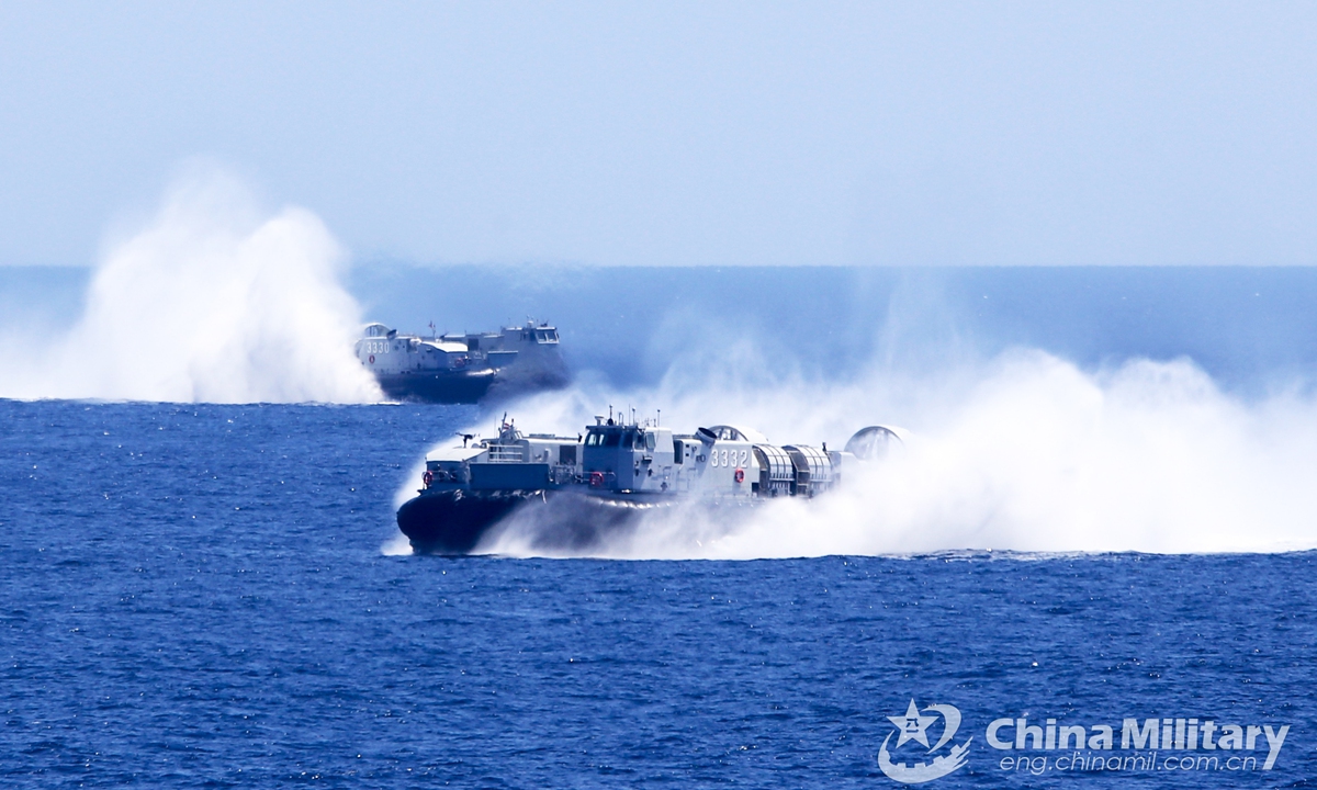 Air-cushion landing crafts attached to a naval landing ship detachment under the PLA Southern Theater Command sails through wind in formation during the actual combat training in late February, 2021.Photo:China Military