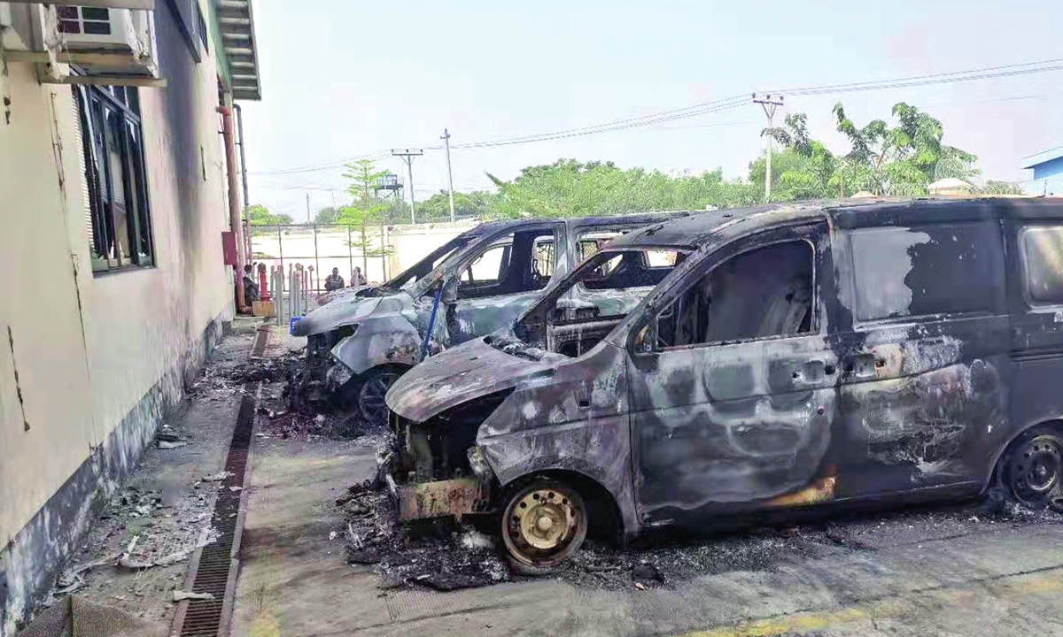 Cars are burned down at a China-invested factory in Yangon, Myanmar. Photo: Interviewee