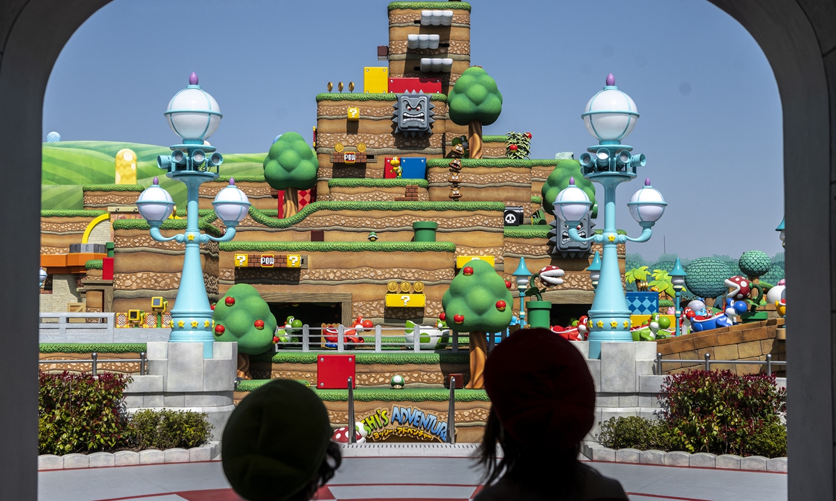 In this picture taken on Wednesday, fans of Universal Studio Japan visit Super Nintendo World, during a media preview of the theme park in Osaka, Japan. Photo: AFP