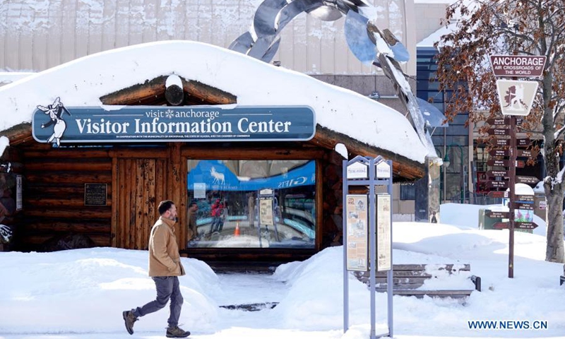 A man walks on the street in Anchorage, Alaska, the United States, March 17, 2021.Photo:Xinhua