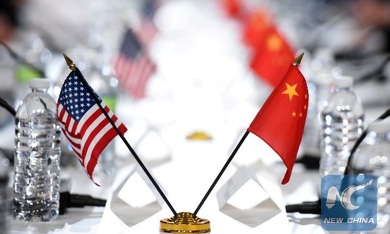 File photo taken on Nov. 23, 2016 shows the national flags of the United States and China during the 27th Session of the China-U.S. Joint Commission on Commerce and Trade (JCCT) in Washington D.C., capital of the United States. Photo:Xinhua