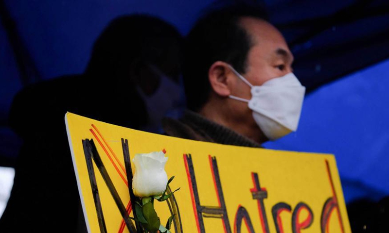 People attend an event to honor the victims of the shootings in the Atlanta Metropolitan area, in New York, the United States, March 18, 2021.   Photo: Xinhua
