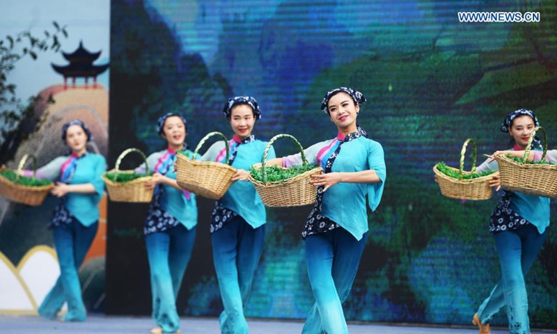 Performers attend the opening ceremony of a tea culture festival held in Dazu District of southwest China's Chongqing Municipality on March 18, 2021. The cultural event is aimed at promoting local tourism.Photo: Xinhua