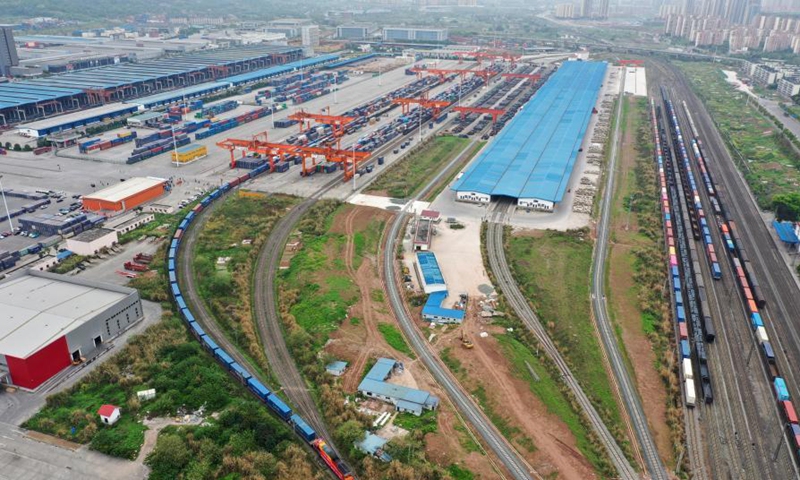 Aerial photo taken on March 19, 2021 shows a Yuxin'ou (Chongqing-Xinjiang-Europe) China-Europe freight train setting out from the Tuanjie Village Station of southwest China's Chongqing Municipality. Photo: Xinhua