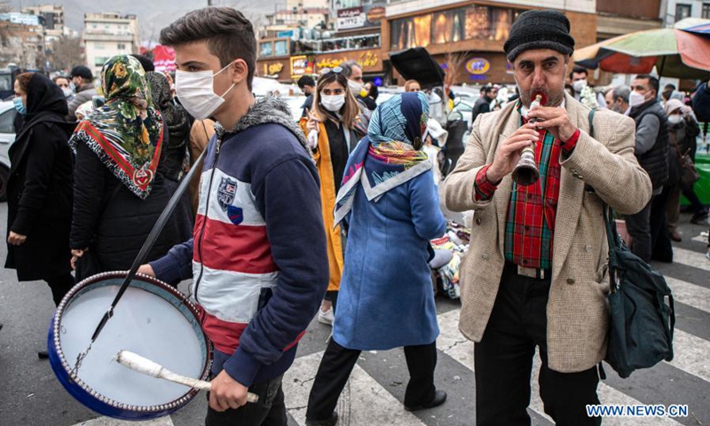 People play traditional music instruments at a bazaar ahead of Nowruz, the Iranian New Year, in Tehran, Iran, March 18, 2021. (Photo: Xinhua)