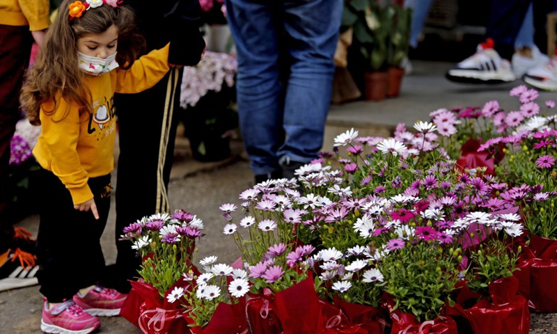 People buy flowers to celebrate Mother's Day in Beirut, Lebanon, on March 20, 2021. The locals celebrate Mother's Day on March 21.(Photo: Xinhua)