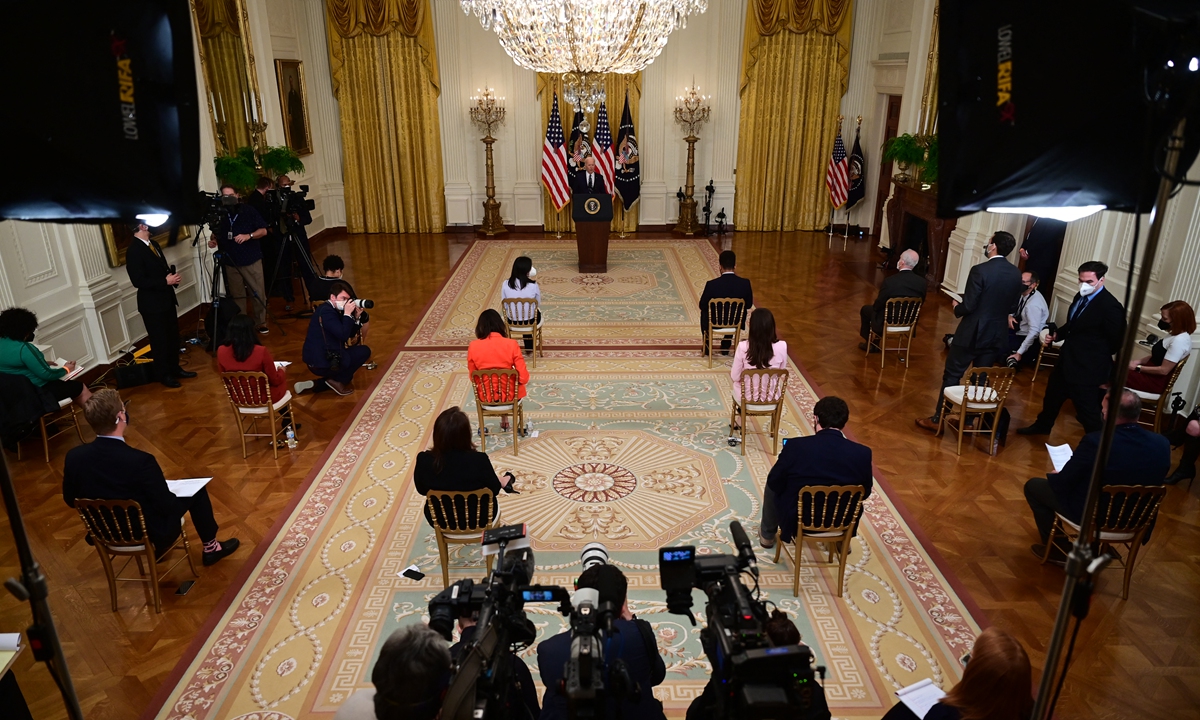 US President Joe Biden answers a question during his first press briefing in the East Room of the White House in Washington, DC, on Thursday local time, 64 days after taking office. Biden vowed to invest heavily to ensure America prevails in the race against China. Photo: AFP