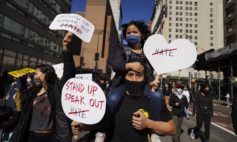 People march during a protest against Asian hate in New York, the United States, on March 21, 2021.(Photo: Xinhua)
