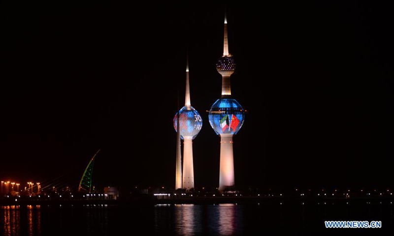 Kuwait Towers are illuminated with Chinese and Kuwaiti flags in Kuwait City, Kuwait, on March 22, 2021. Monday marks the 50th anniversary of the establishment of diplomatic relations between China and Kuwait.(Photo: Xinhua)